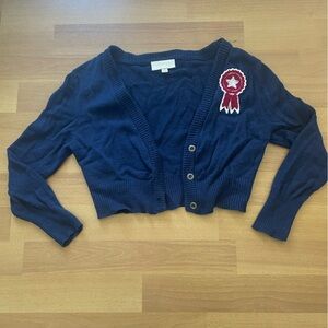 ModCloth cropped sweater with cute badge